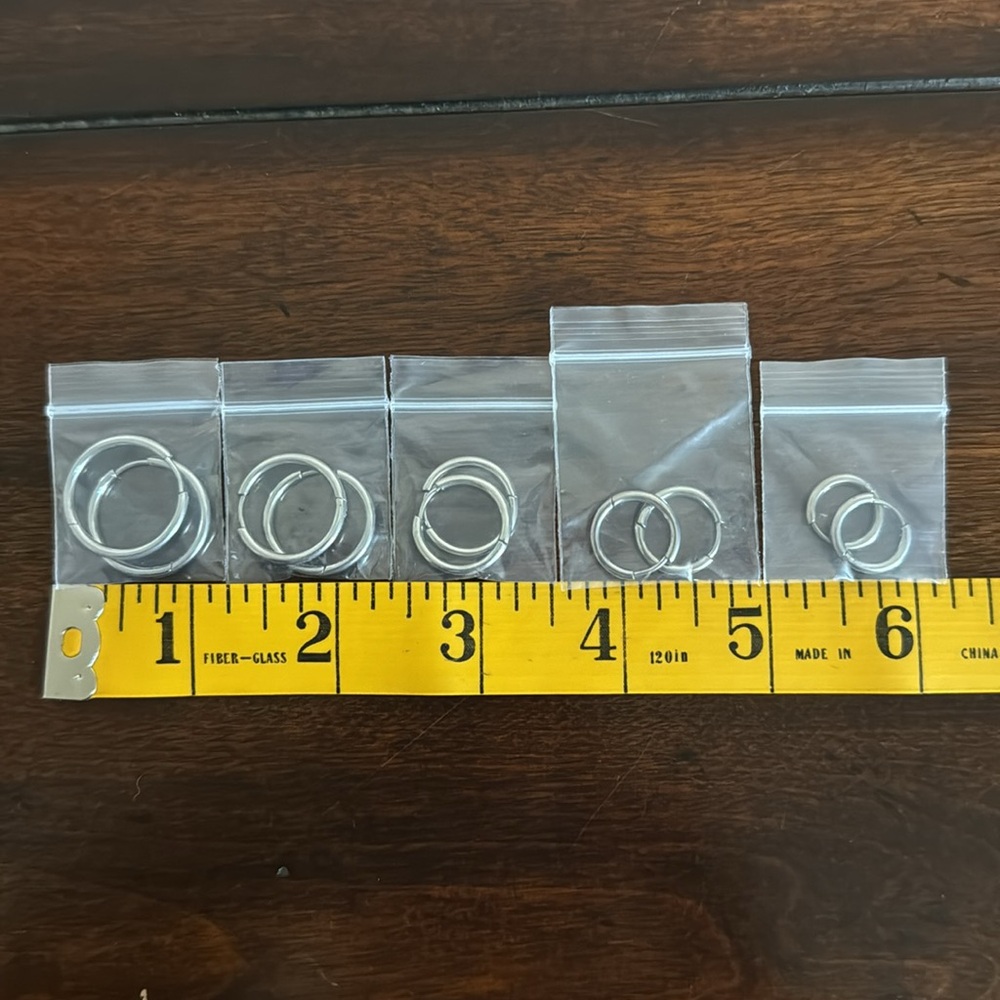 NEW 9 Pairs Silver Hoop Earrings with Box & Cleaning Cloth - Picture 4 of 8